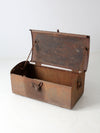 antique riveted iron trunk