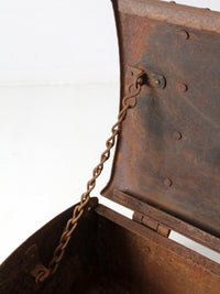 antique riveted iron trunk