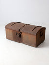 antique riveted iron trunk