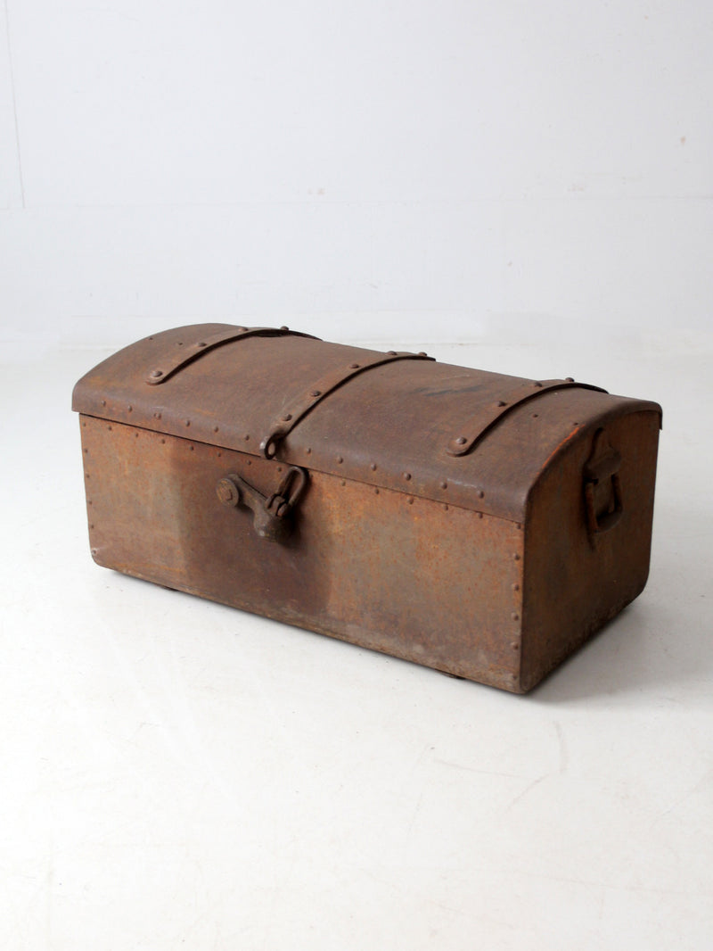 antique riveted iron trunk