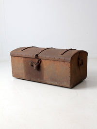 antique riveted iron trunk