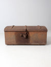 antique riveted iron trunk