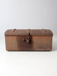 antique riveted iron trunk