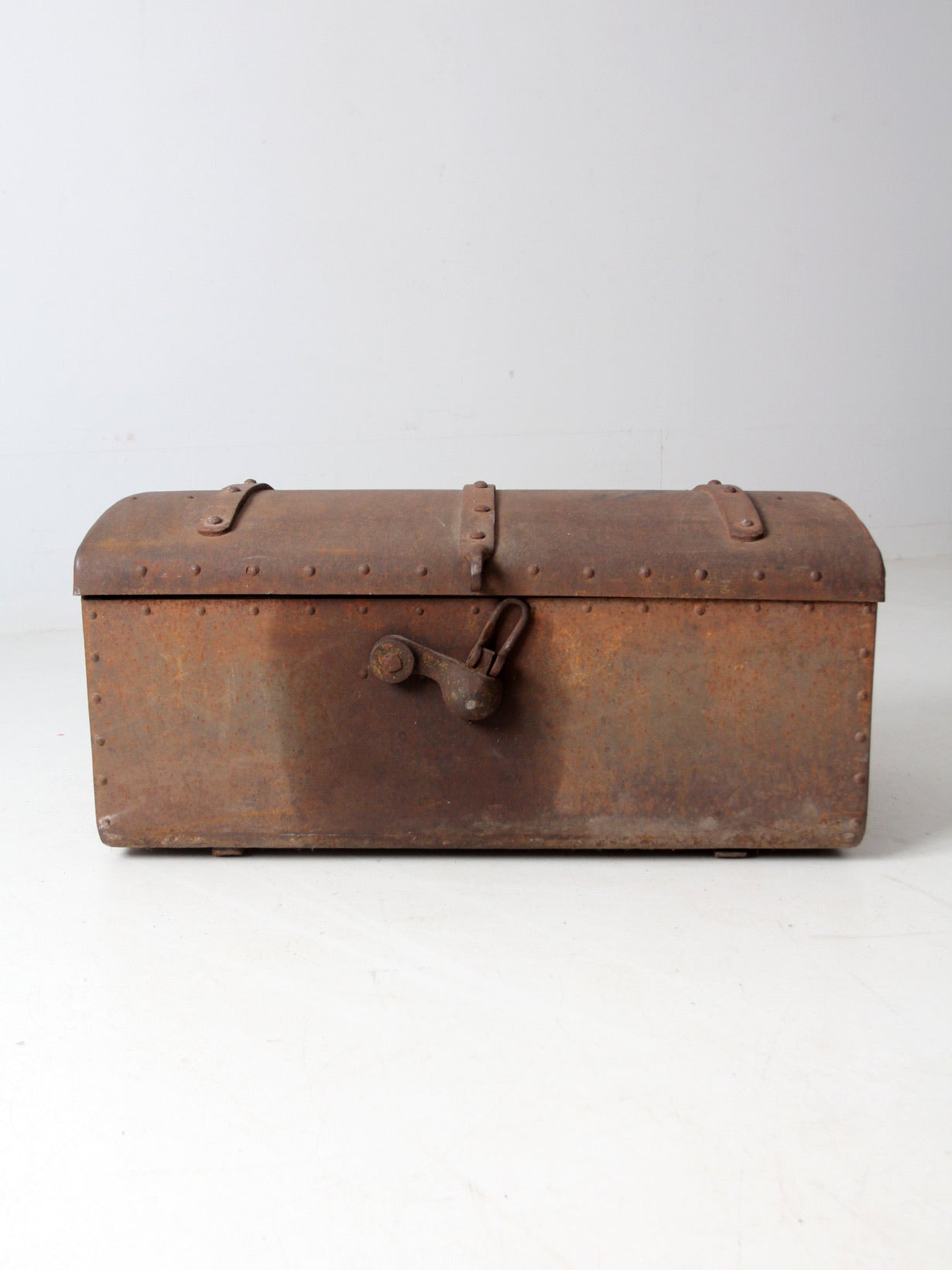 antique riveted iron trunk