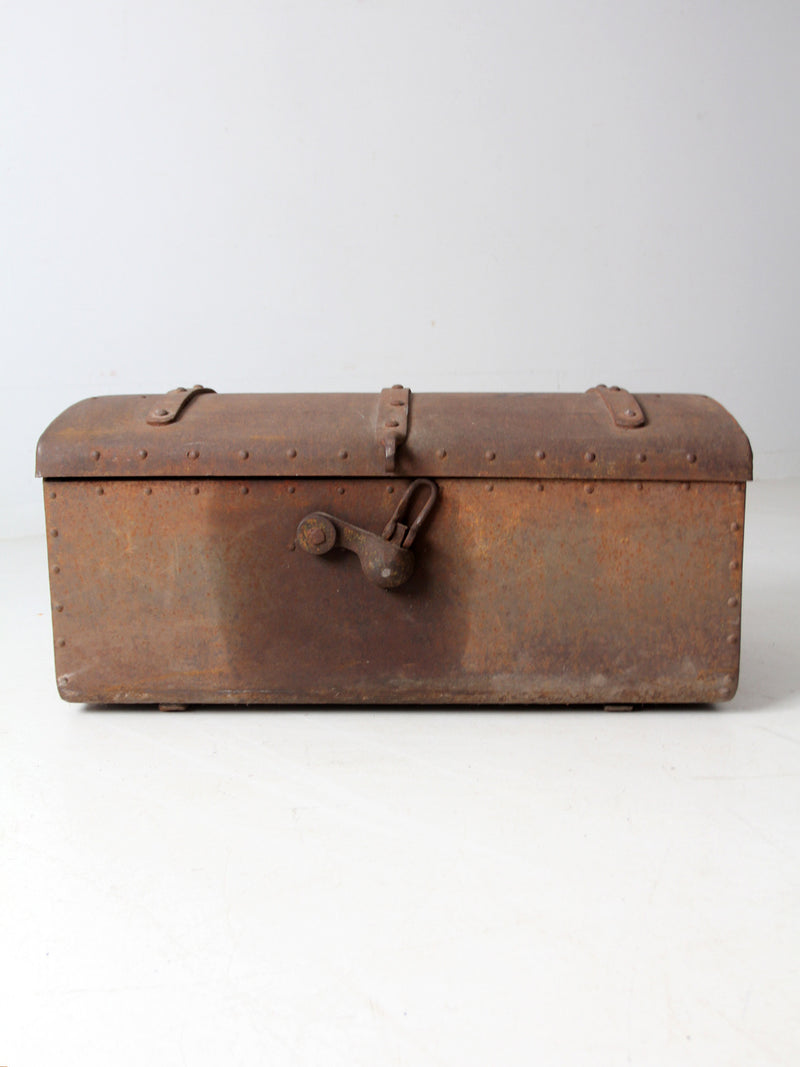 antique riveted iron trunk