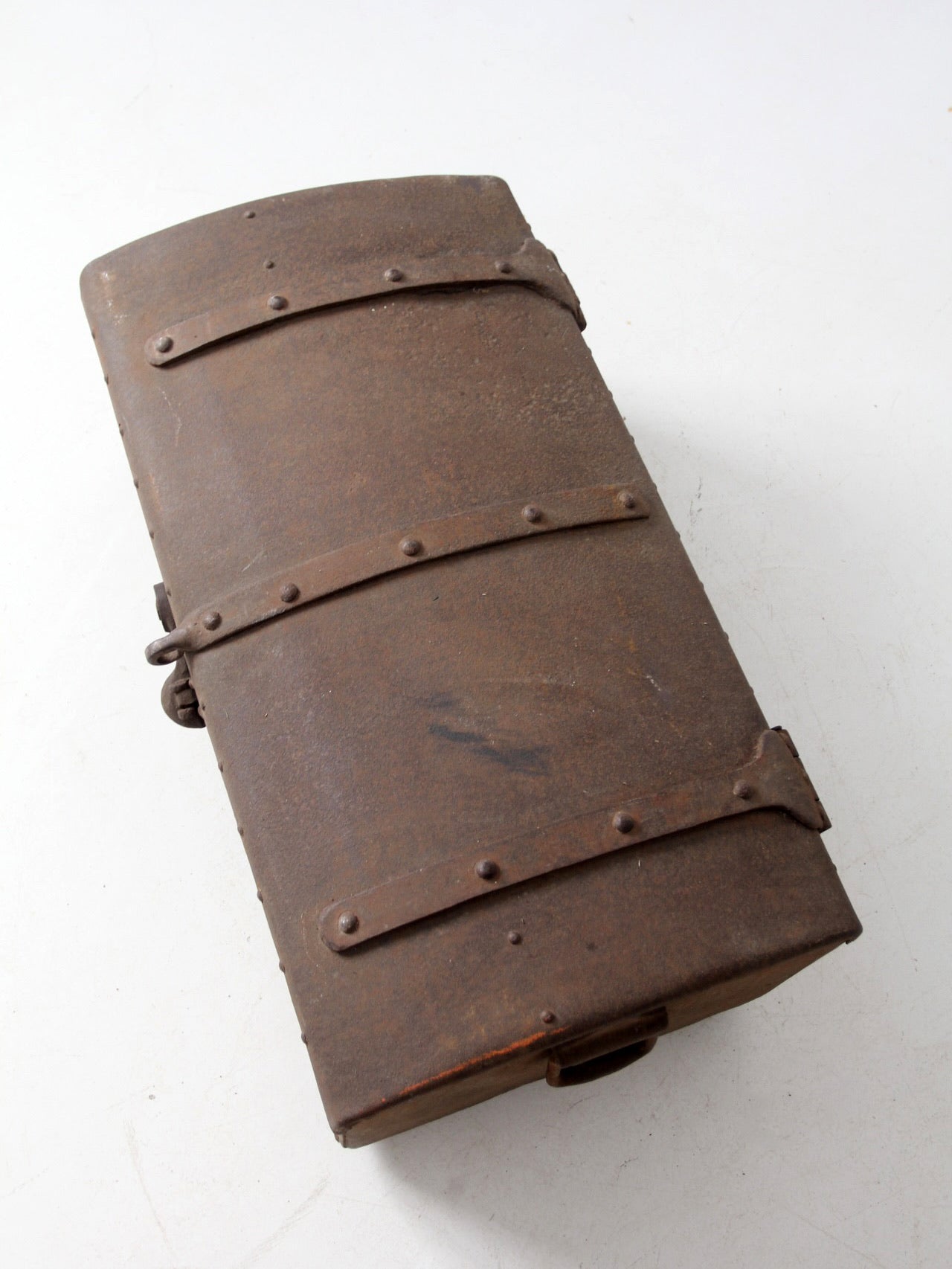 antique riveted iron trunk