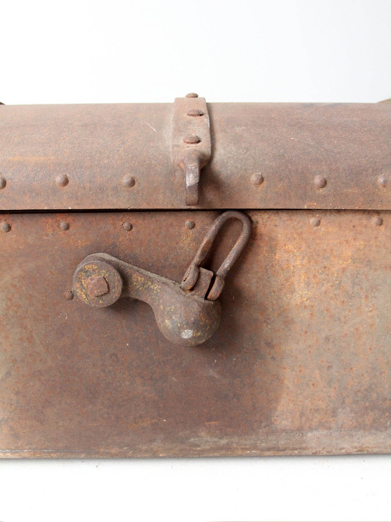 antique riveted iron trunk