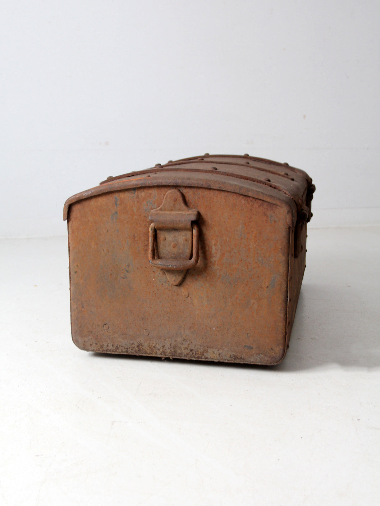 antique riveted iron trunk