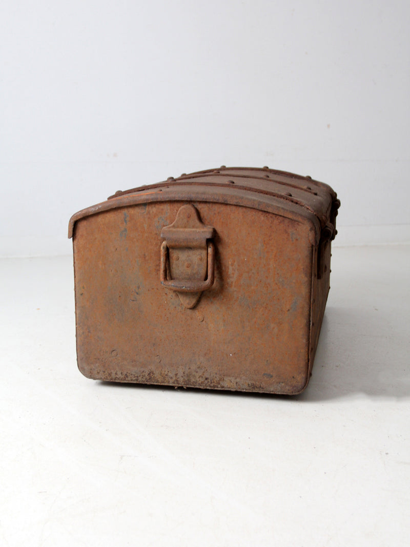 antique riveted iron trunk