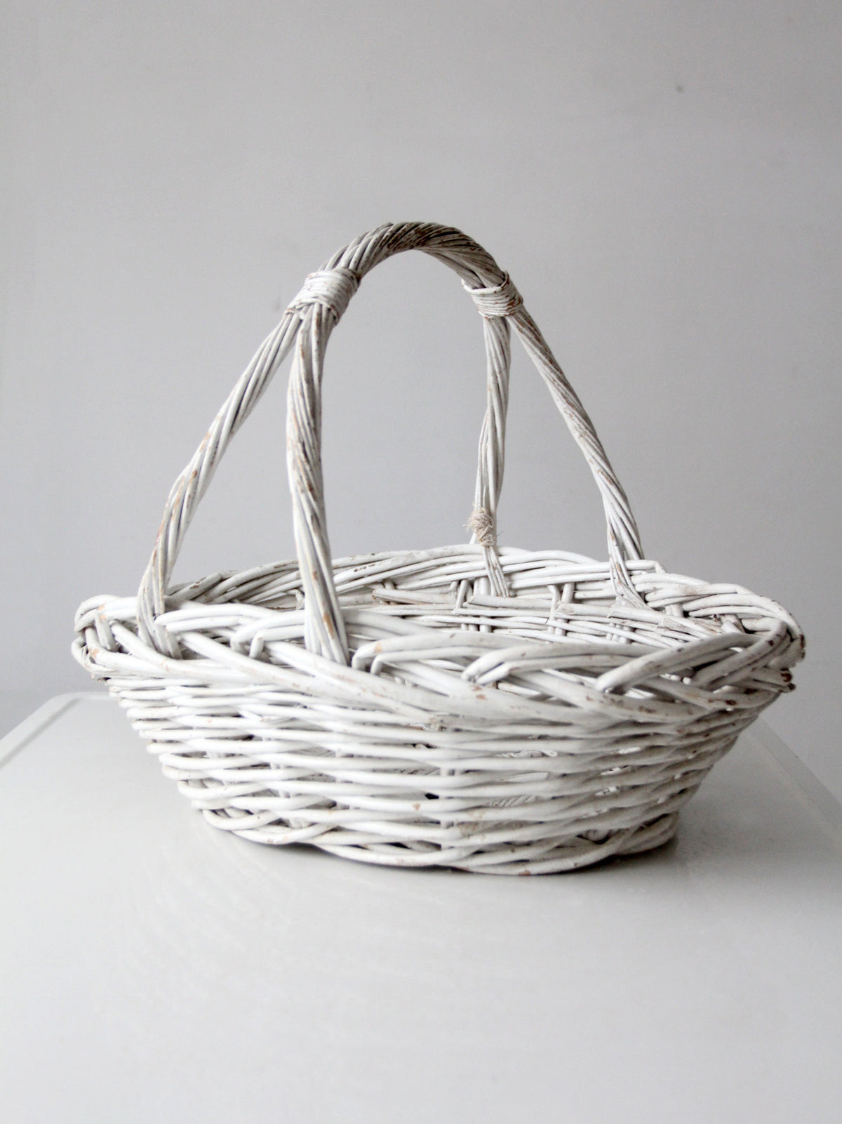 vintage white wicker gathering basket