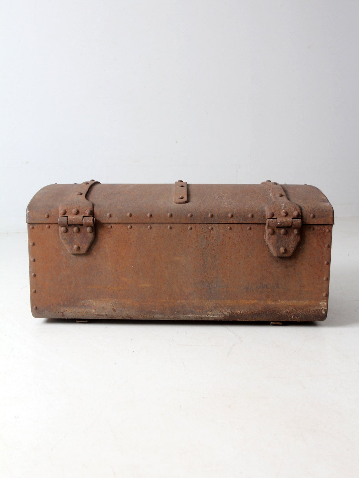 antique riveted iron trunk