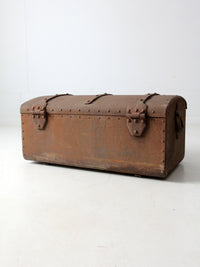 antique riveted iron trunk