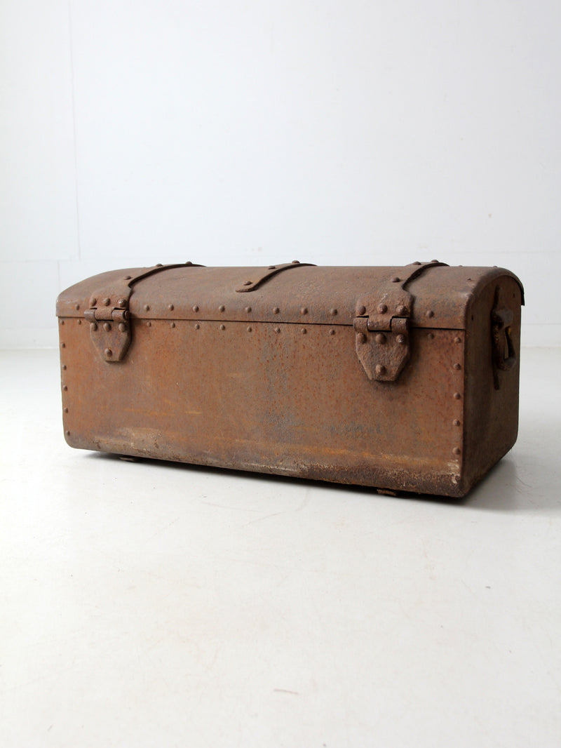 antique riveted iron trunk