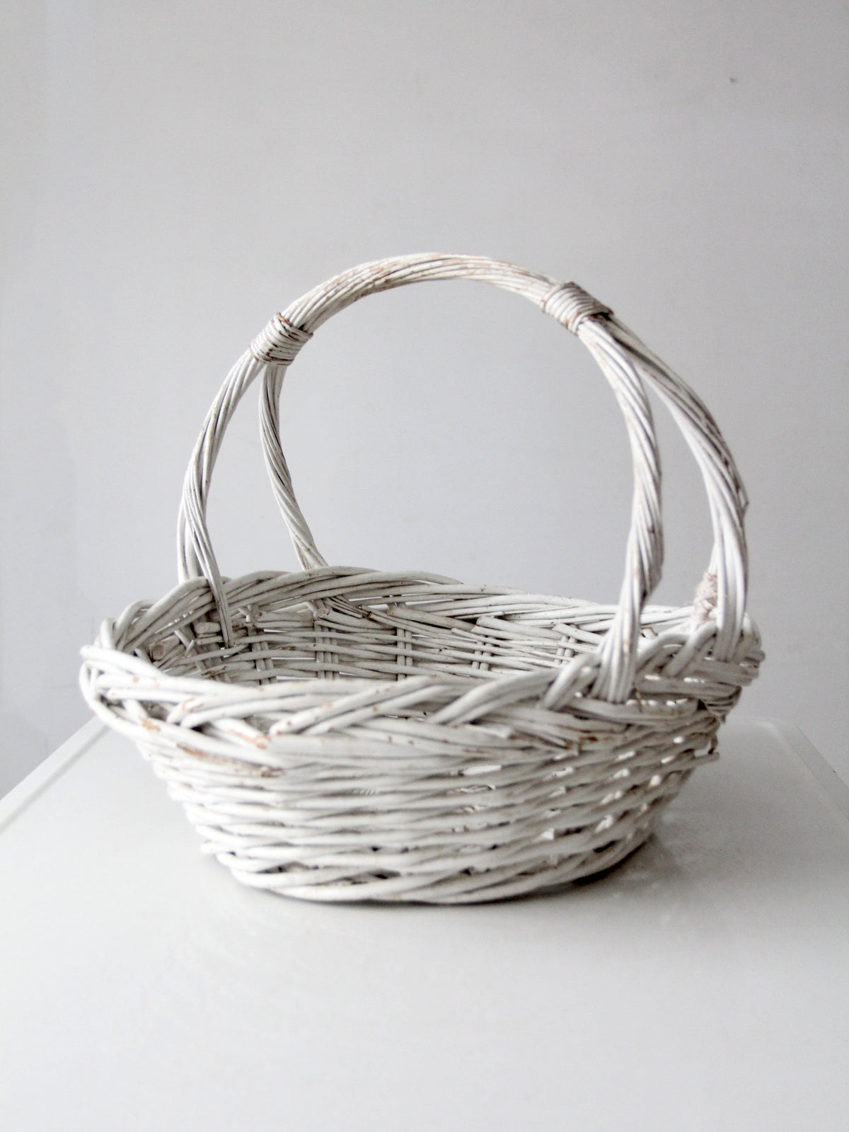 vintage white wicker gathering basket