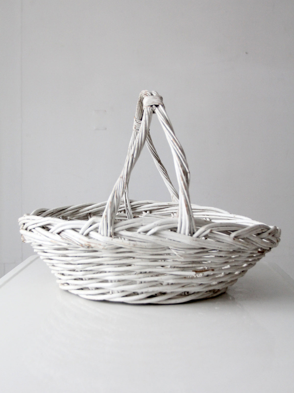 vintage white wicker gathering basket
