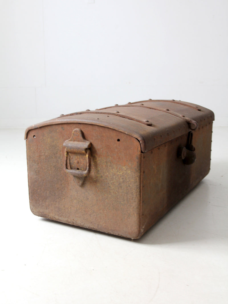 antique riveted iron trunk