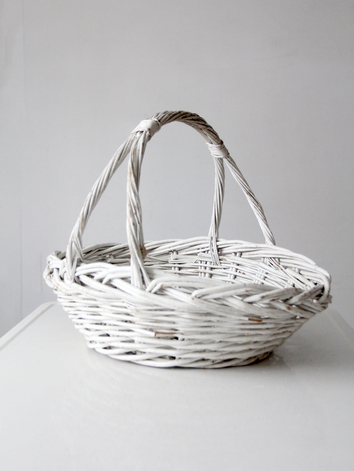 vintage white wicker gathering basket
