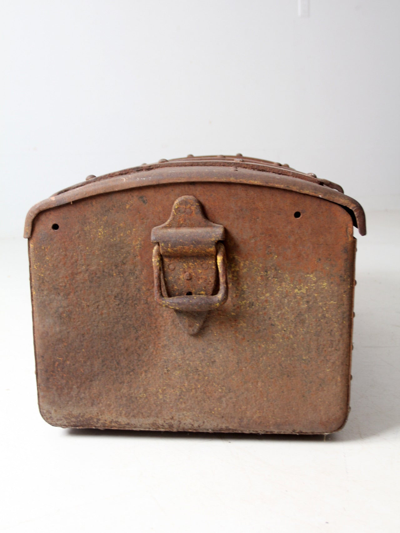 antique riveted iron trunk