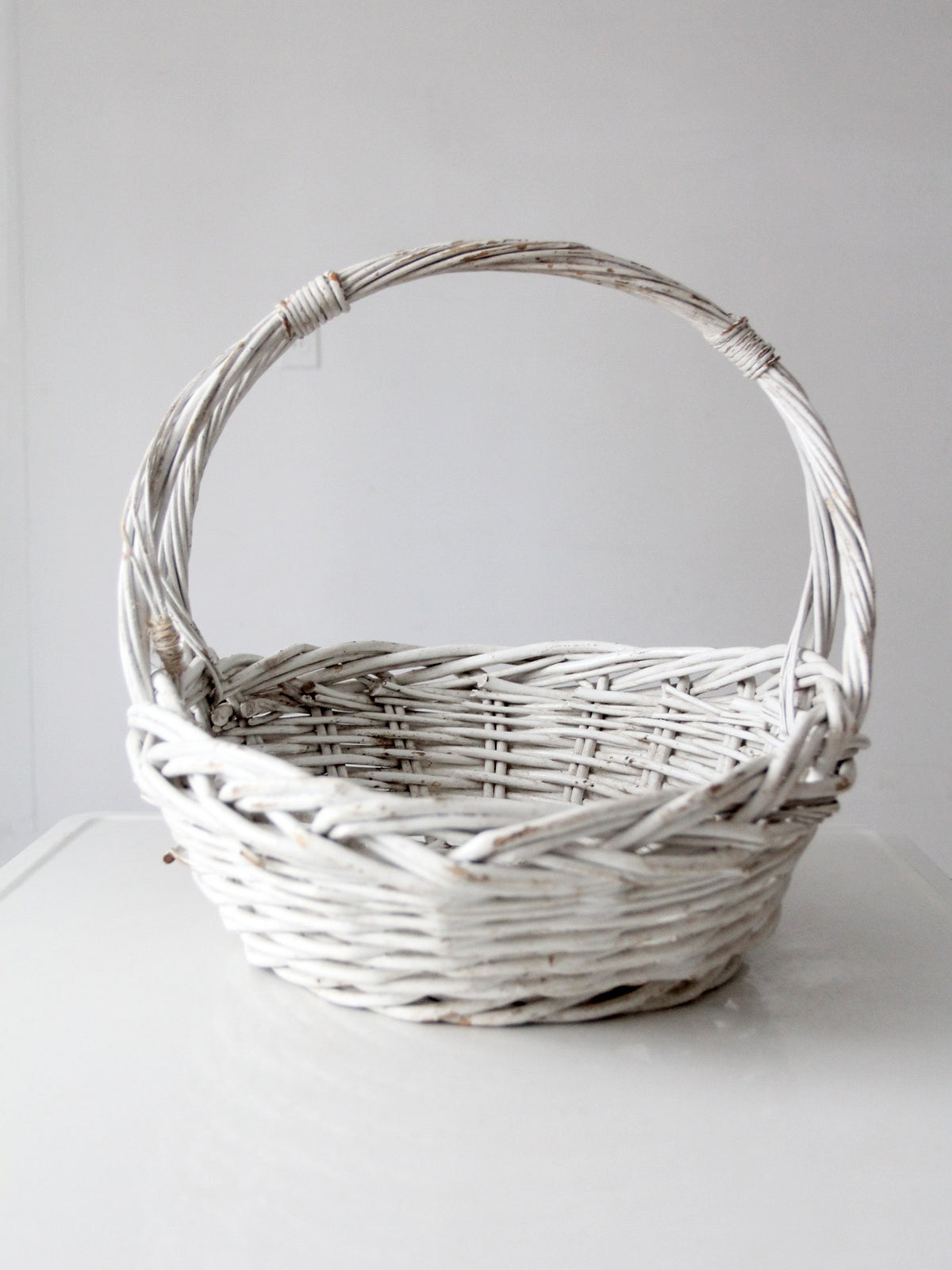 vintage white wicker gathering basket
