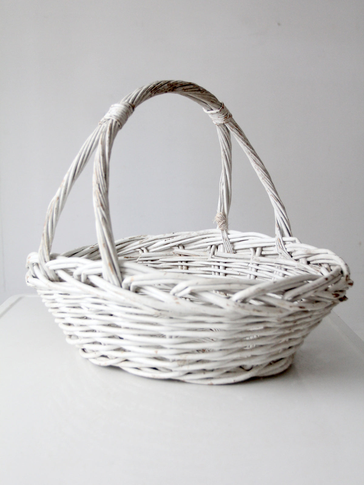 vintage white wicker gathering basket