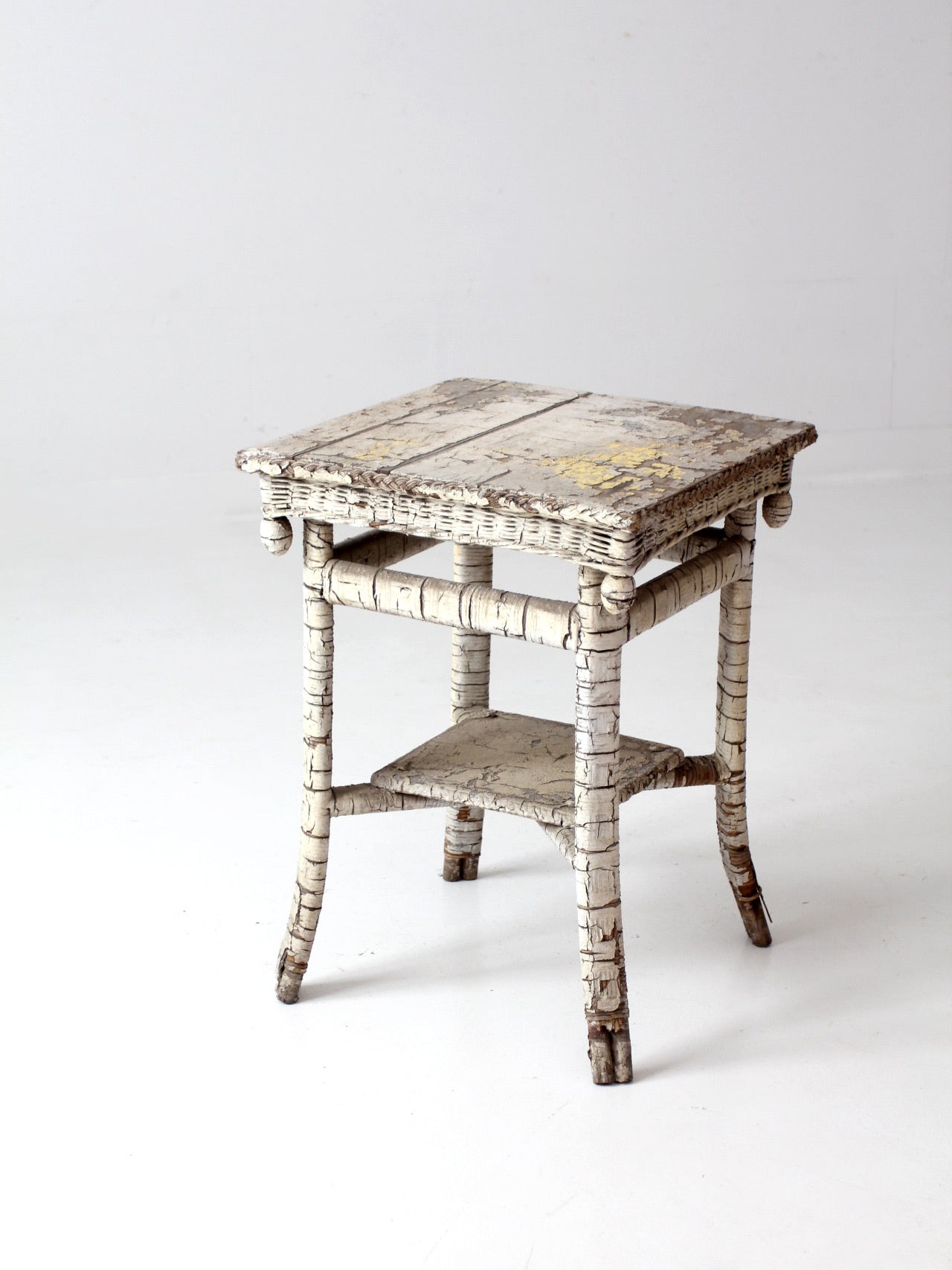 antique rustic white end table