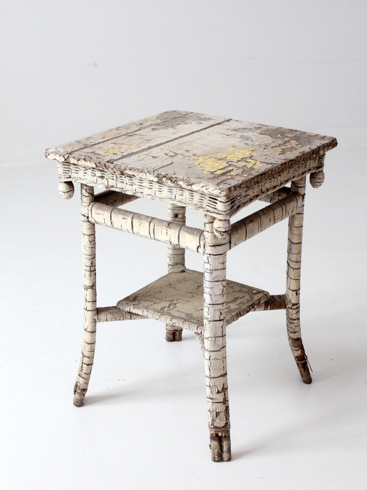 antique rustic white end table