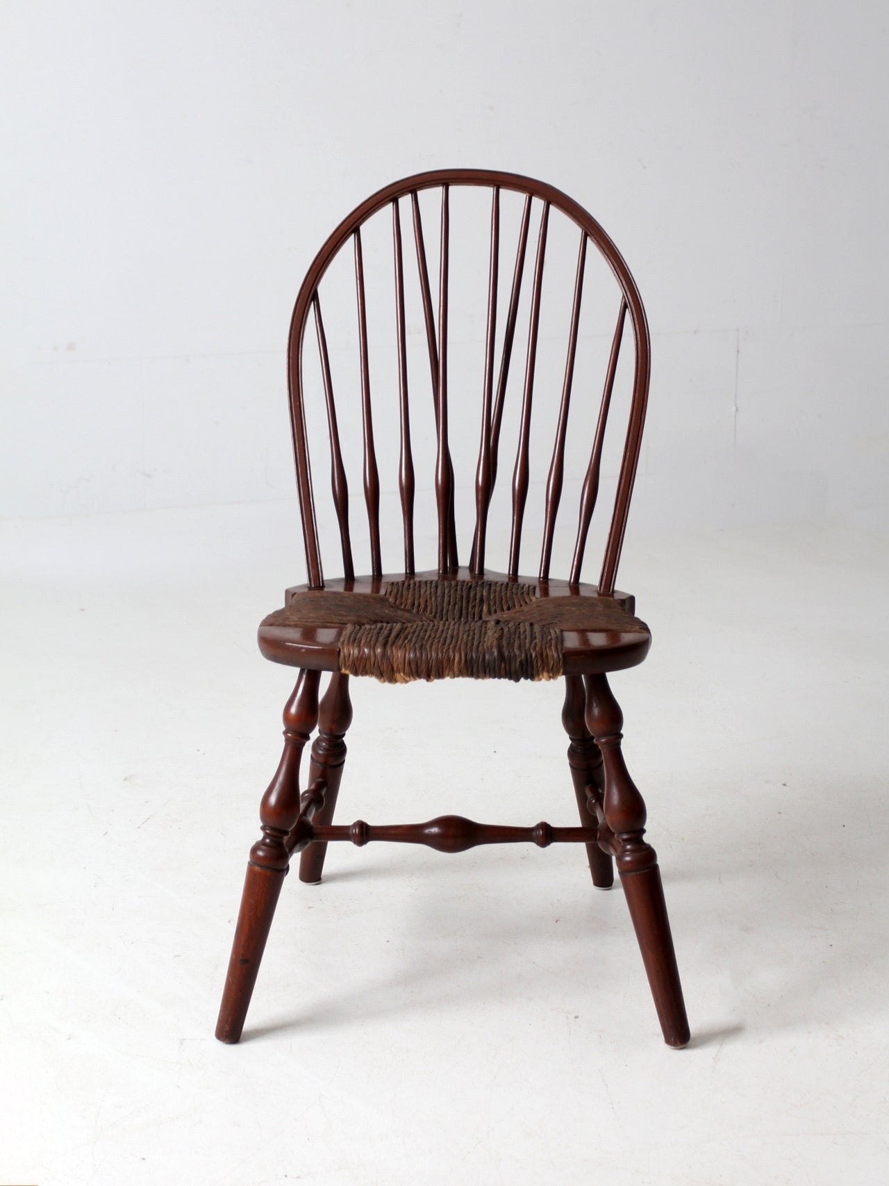 antique brace back Windsor chair with rush seat