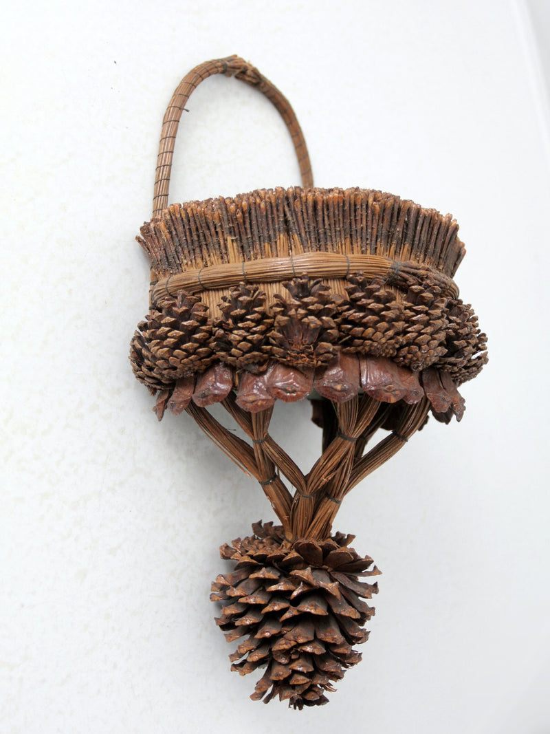vintage folk art pinecone wall basket