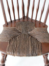 antique brace back Windsor chair with rush seat