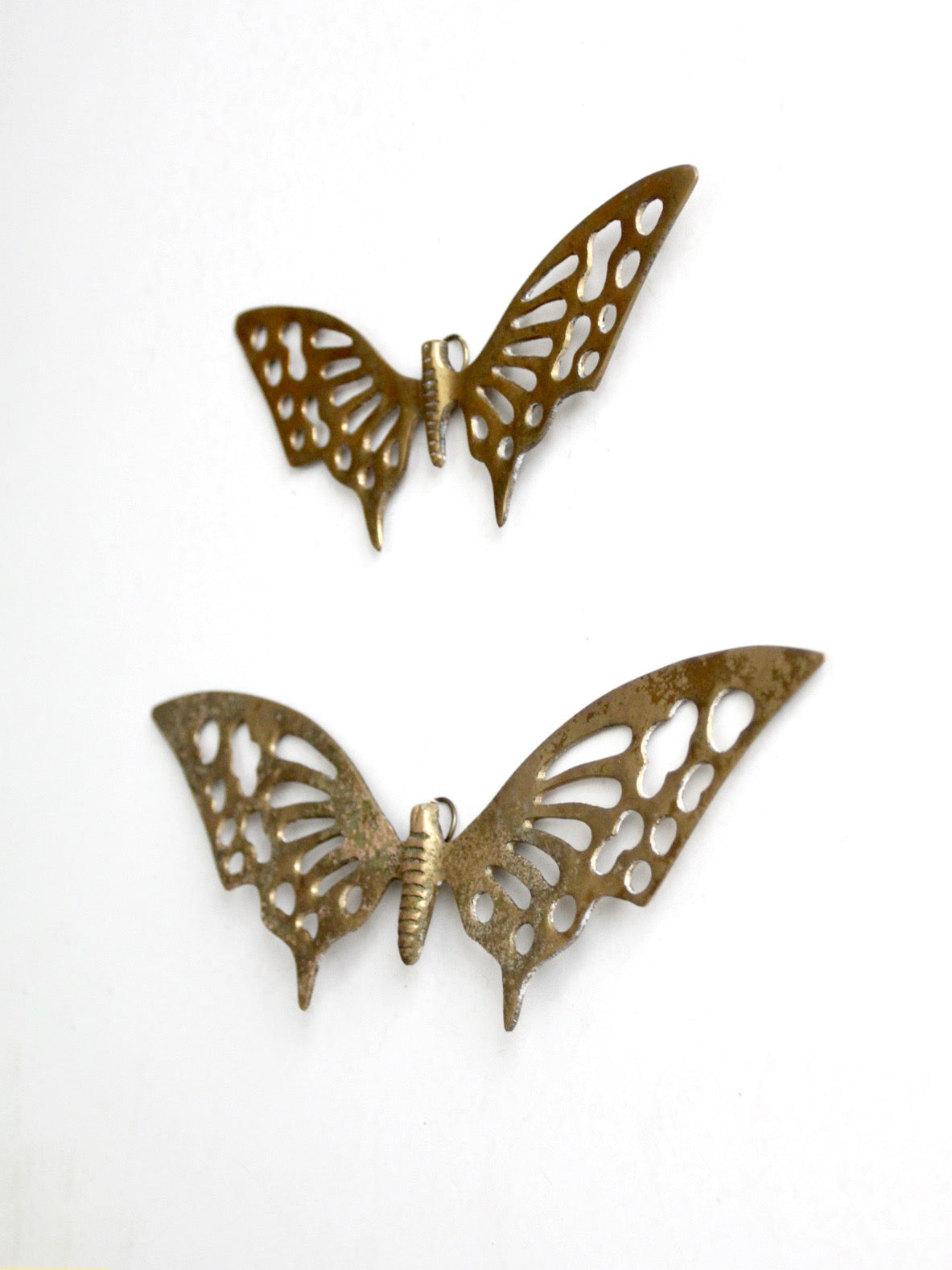 pair of vintage mid-century brass butterfly wall hangings
