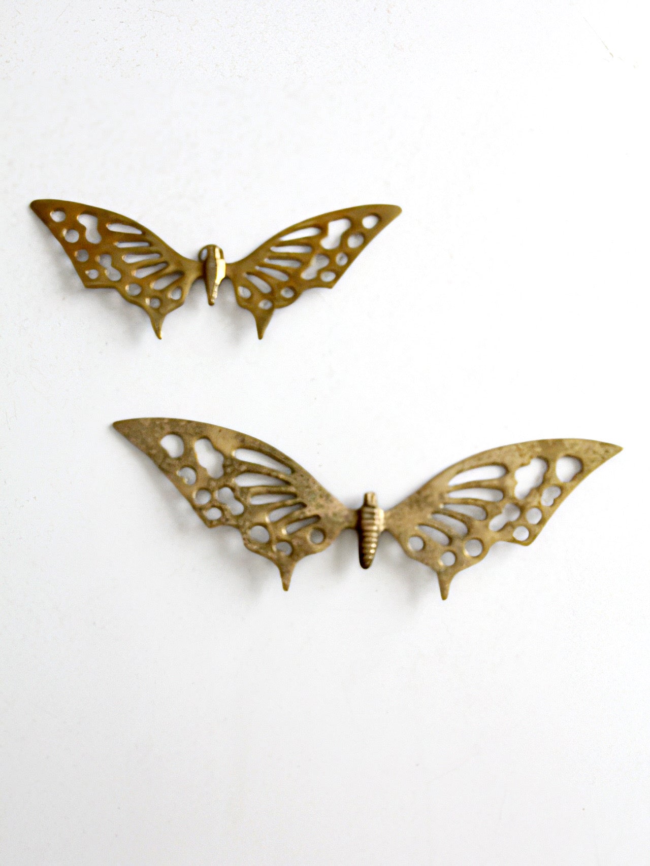 pair of vintage mid-century brass butterfly wall hangings