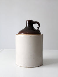 antique stoneware jug with brown glaze