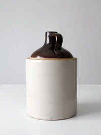 antique stoneware jug with brown glaze