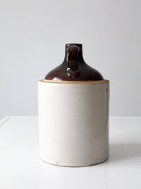 antique stoneware jug with brown glaze