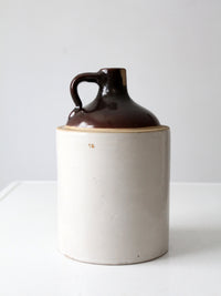 antique stoneware jug with brown glaze