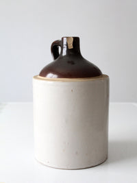 antique stoneware jug with brown glaze