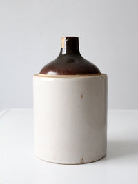 antique stoneware jug with brown glaze