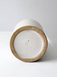antique stoneware jug with brown glaze