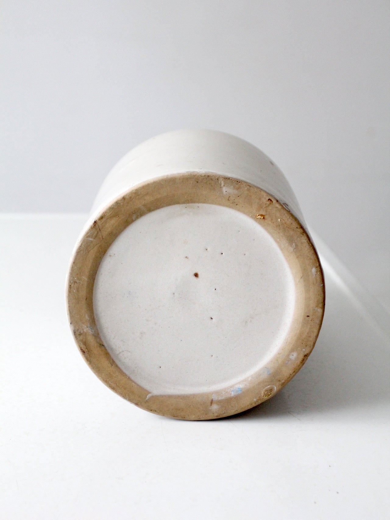 antique stoneware jug with brown glaze