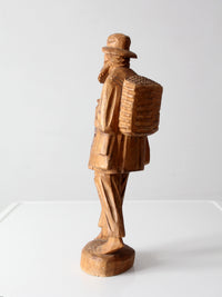 mid-century folk art carved wood peddler figure