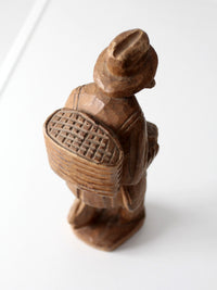 mid-century folk art carved wood peddler figure
