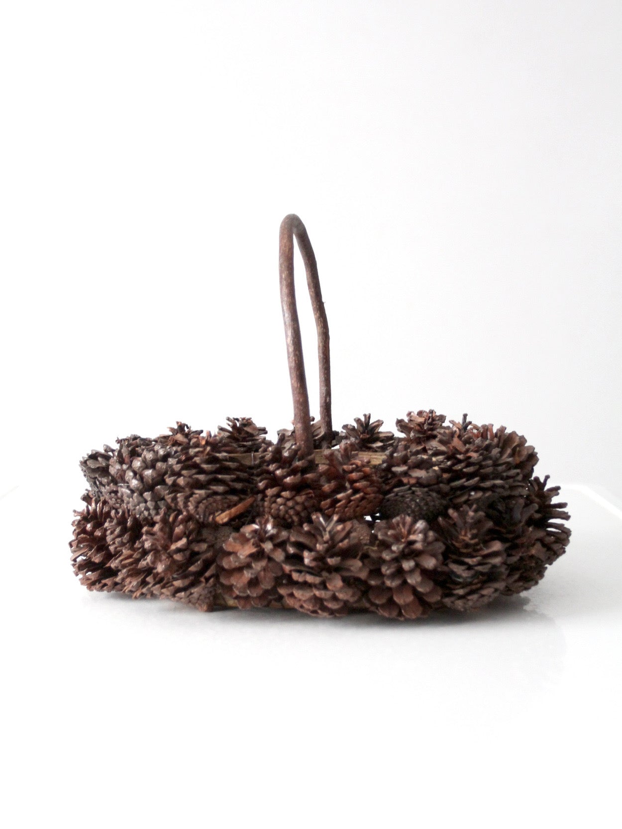 vintage handmade pinecone basket