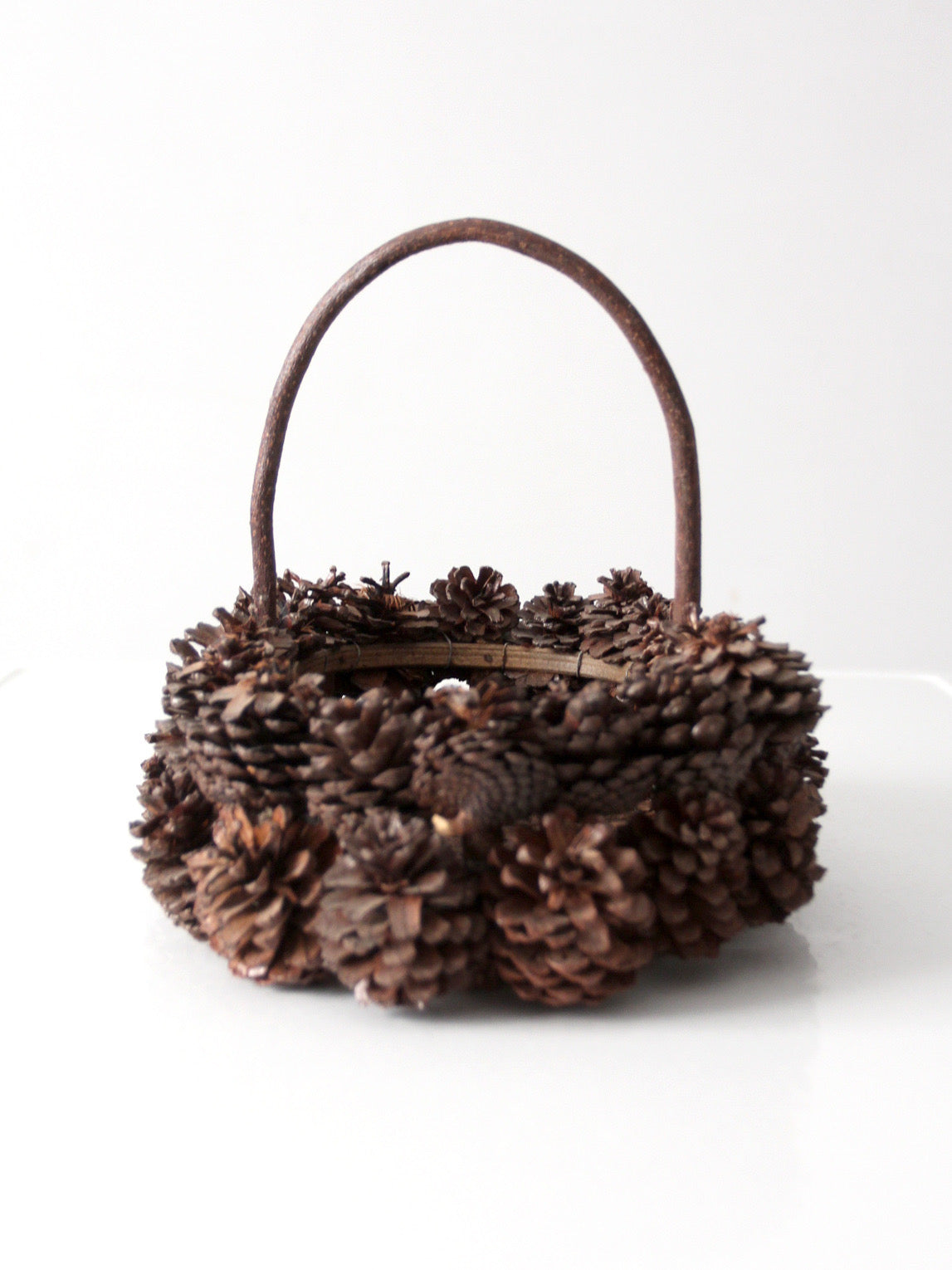 vintage handmade pinecone basket