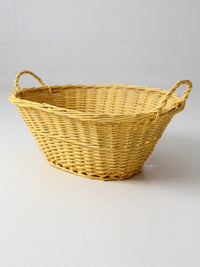 vintage yellow wicker laundry basket