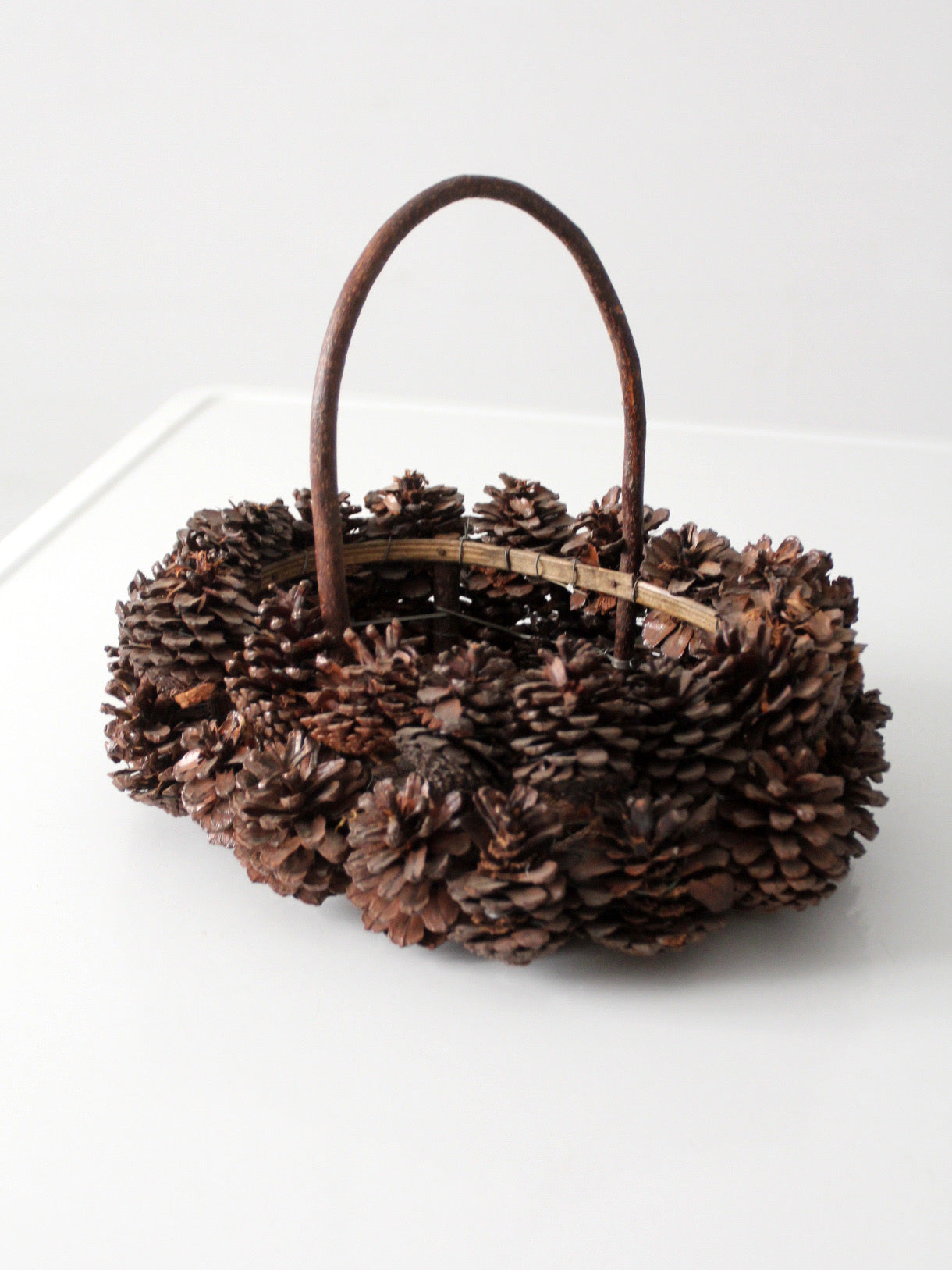 vintage handmade pinecone basket