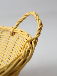 vintage yellow wicker laundry basket
