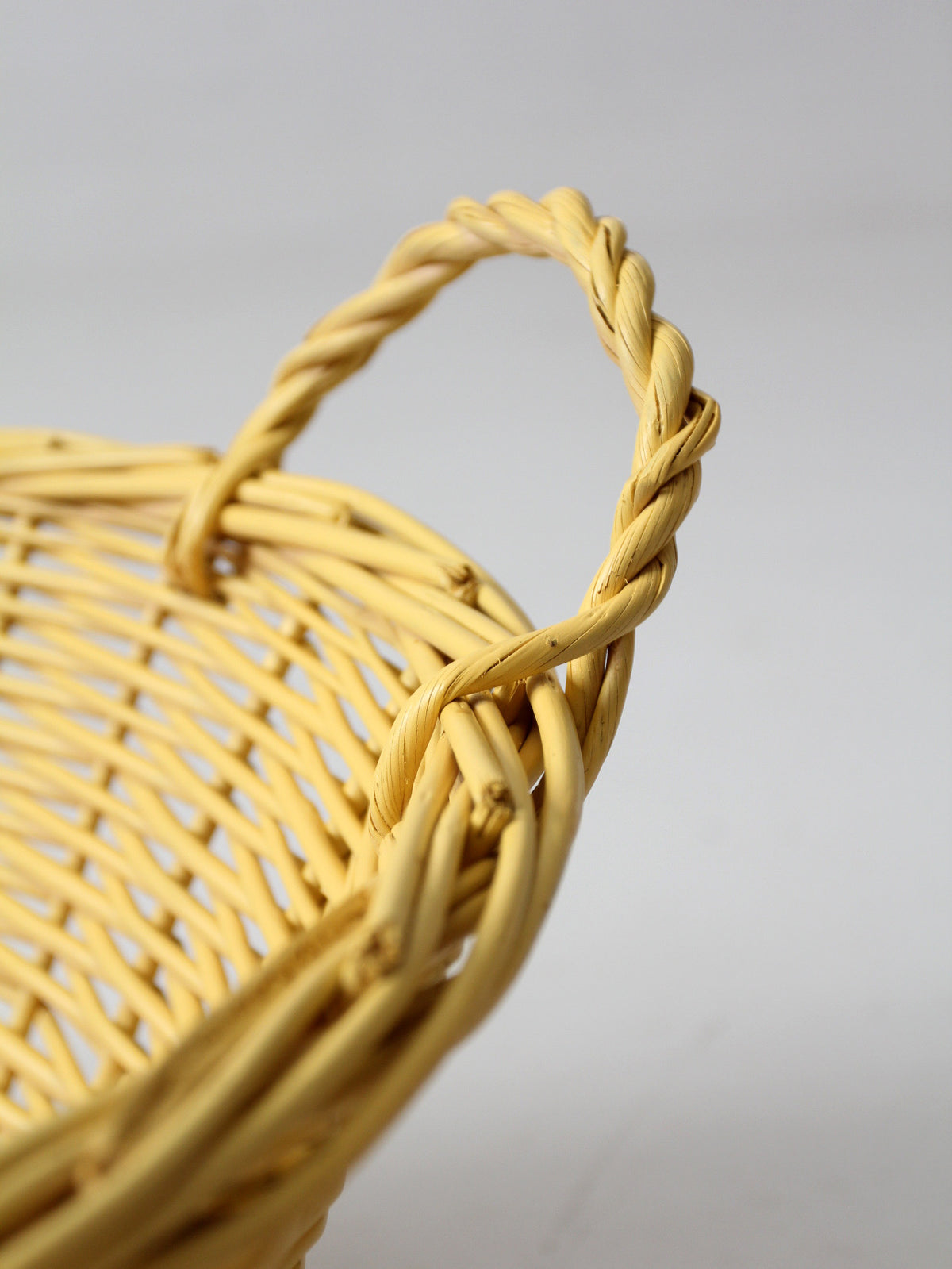 vintage yellow wicker laundry basket