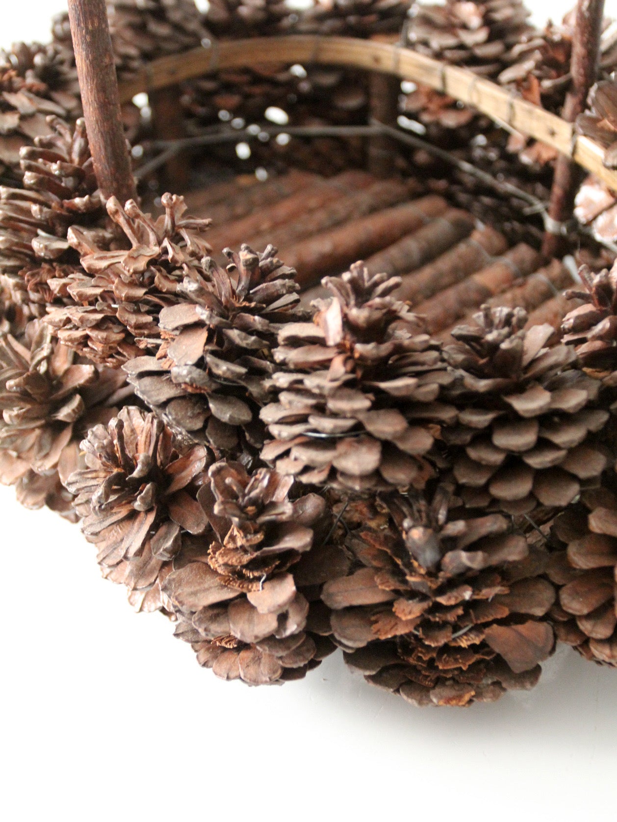 vintage handmade pinecone basket