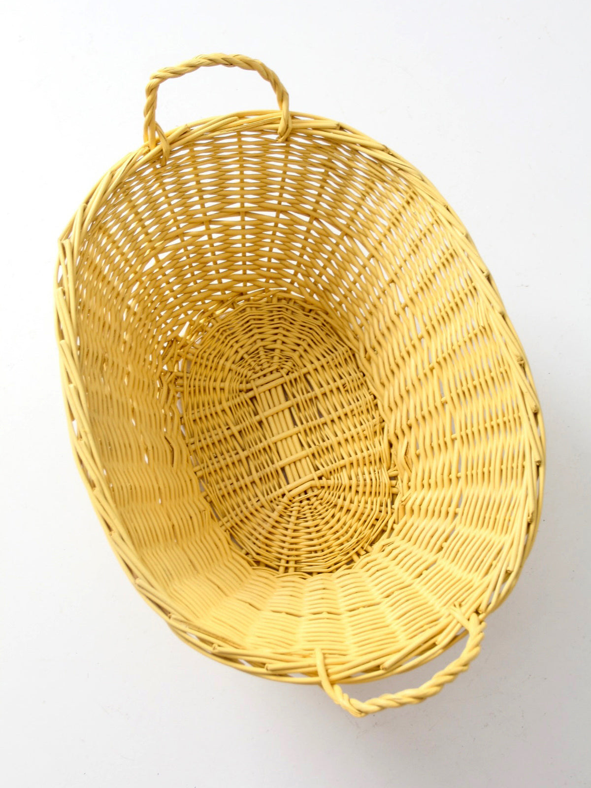 vintage yellow wicker laundry basket