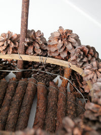 vintage handmade pinecone basket